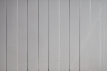 Light gray color PVC garage door texture detail.