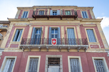 Fototapeta na wymiar Facade of Swiss consulate building in Corfu town, capital of Corfu Island, Greece