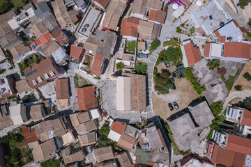 High angle drone photo of Benitses town on the Ionian Sea shore on Corfu Island, Greece