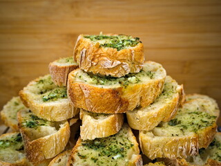 Pyramid of French baked baguettes with garlic butter