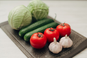 Fresh and Bright Vegetables Lie on the Kitchen Table