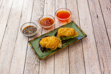 crispy Vietnamese prawns with assorted sauces for dipping