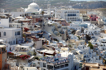 Beautiful Greek island Santorini and center town Fira, Greece. Santorini in the southern Aegean Sea, about 200 km southeast from the Greek mainland.