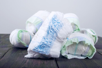 Diapers waste, dirty diapers. Disposing of used baby nappies. Environmental Impact of Disposable...