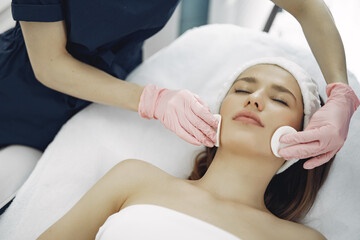 Fototapeta na wymiar Woman in cosmetology studio on a procedures