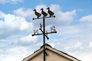 Weather vane with 3 ducks in the village of Great Mitton in the Ribble valley - obrazy, fototapety, plakaty