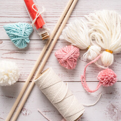 Top view of Colorful knitting yarn ball thread and knitting needles hobby craft concept