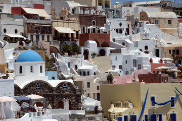 Oia Town at beautiful Greek island Santorini in Greece. Oia is a small town and former community in the South Aegean on the Santorini.