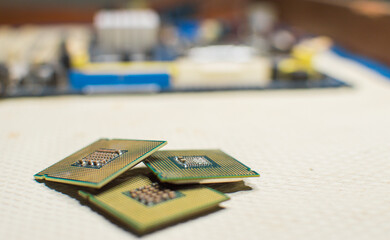 isolated computer microprocessors, three computer processors with one computer motherboard, computer processor concept