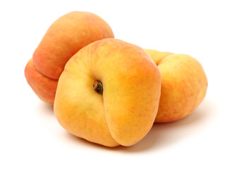chinese flat peaches on white background 