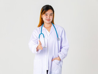 Portrait studio shot of Asian successful professional female clinical doctor in lab coat uniform hanging stethoscope around neck standing smiling  and give hand for shaking