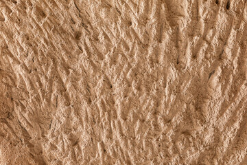 texture of old soft tuff stone wall with abstract pattern