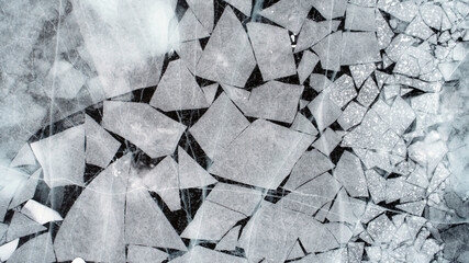 Lake Baikal ice texture. Cracks in the ice. Frozen Lake Baikal.