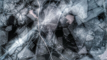 Lake Baikal ice texture. Cracks in the ice. Frozen Lake Baikal.
