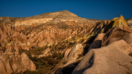 Fototapeta na wymiar Awesome view of unusual rocky landscape in Cappadocia, Turkey.