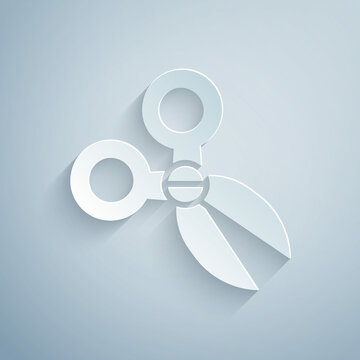 Paper cut Scissors icon isolated on grey background. Cutting tool sign. Paper art style. Vector