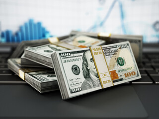 Dollar bills standing on laptop keyboard. 3D illustration