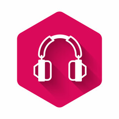 White Headphones icon isolated with long shadow background. Earphones. Concept for listening to music, service, communication and operator. Pink hexagon button. Vector