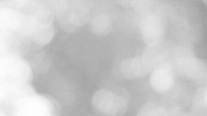 The illuminated white bokeh image can be used as a background illustration or add text.