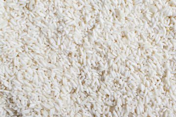 Beautiful clean white rice grain texture background close-up abstract