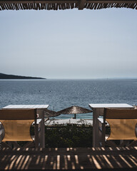 table and chairs on the beach