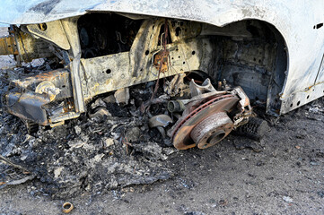 Fototapeta na wymiar car totaly burnt up standing in rural site