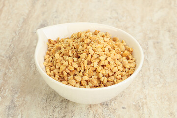 Crunched roasted peanut in the bowl