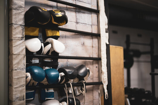 a wall where boxing gloves hang