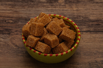 Cane sugar cubs in the bowl