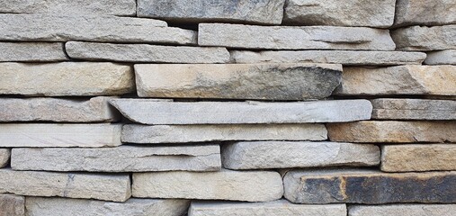 Wall of stone plates. Stone wall texture. Stone bricks. Stone wall background.