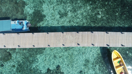The wooden bridge on the island of Kanawa, Labuan Bajo, Indonesia