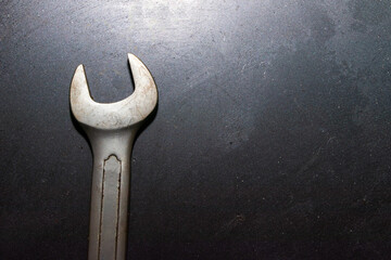 wrench on a dark background