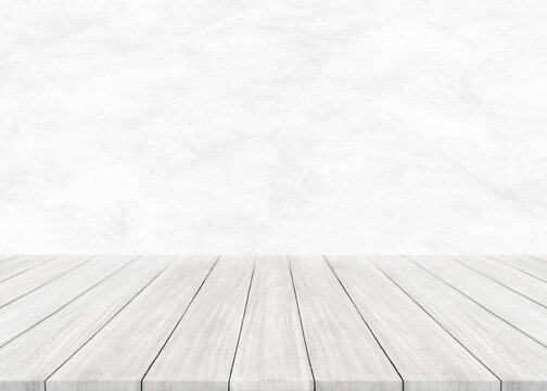 Empty white wood table top and blur wall. Wall Texture Background. Building banner mock up abstract background - can used for display or montage your products.