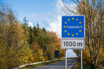 Sign indicating the French border in German
