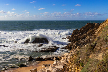 Waves Crashing Over a Rock