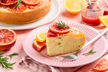 Blood orange upside down cake or pie on a plate. Slice of fruit citrus cake. Selective focus