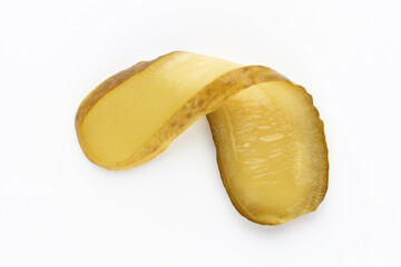 Sliced green pickles isolated on white background.