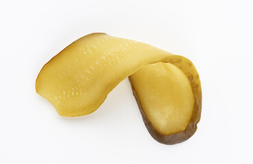 Sliced green pickles isolated on white background.