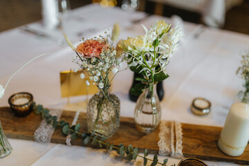 Naklejka na ściany i meble Beautiful table decoration at a wedding