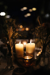 Beautiful candles and table decoration at a wedding