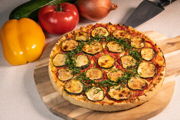 Vegetarian Provencal quiche recipe with vegetables, zucchini, tomato, pepper, onion, parsley. High quality photo
