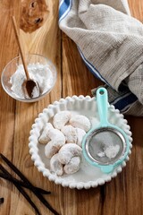 Fototapeta na wymiar Fresh Vanilla Cookies Vanillekipferl With Powdered Sugar