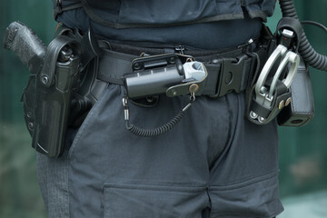 Close-up Dutch police belt with  equipment. - obrazy, fototapety, plakaty