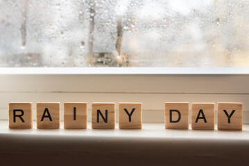 rainy day sign with wooden letters