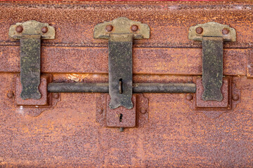 An old rusted iron chest for storing treasure.
