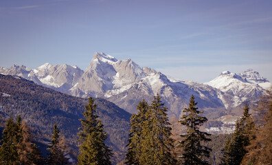 Mountain winter landscape. View from Passo Staulanza on the Dolomites with the first snow. Vacation concept in the Italian mountains.