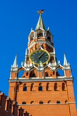 Spasskaya Tower Chiming Clock in Moscow Kremlin, Details of famous architecture building, closeup view, sunny day.