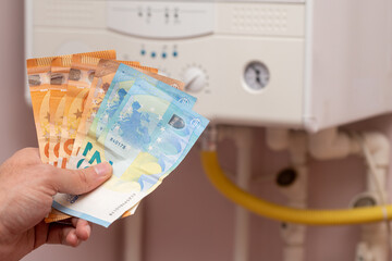 European energy crisis. increase in gas prices in Europe for the population. Euro banknotes in...