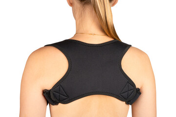 Posture corrector. Woman wearing back support belt for support and improve back posture isolated on white background. Scoliosis treatment. Orthopedic posture corrector. Back view - obrazy, fototapety, plakaty