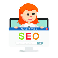 seo keyword search hold by busnisswoman in monitor pc